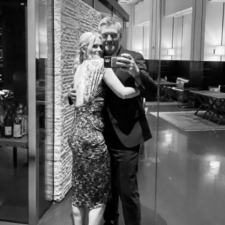 Bryan Spies and his wife Abigail Hawk photographed together.